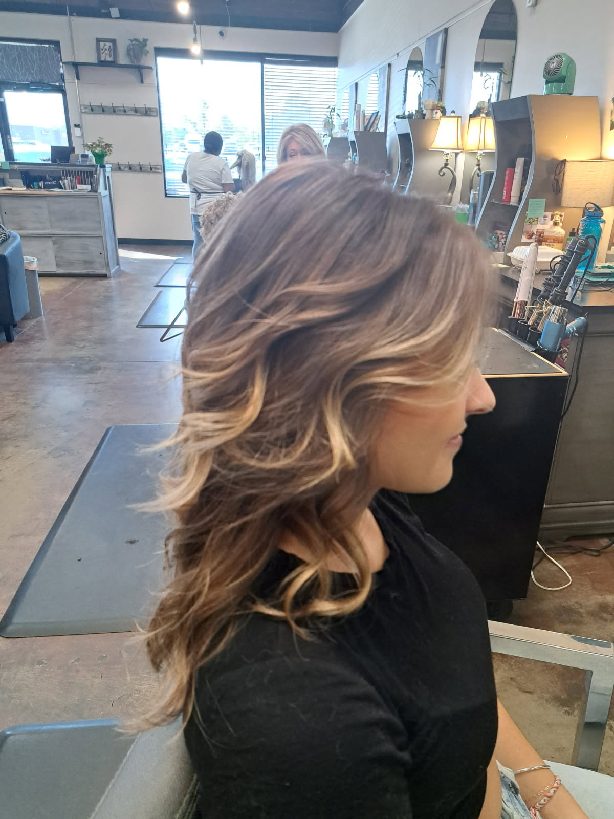 Blonde layered styling by Cat Duran